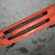 решетка радиатора нижняя (ступень) б/у \ Цвет оранжевый, 5я серия.